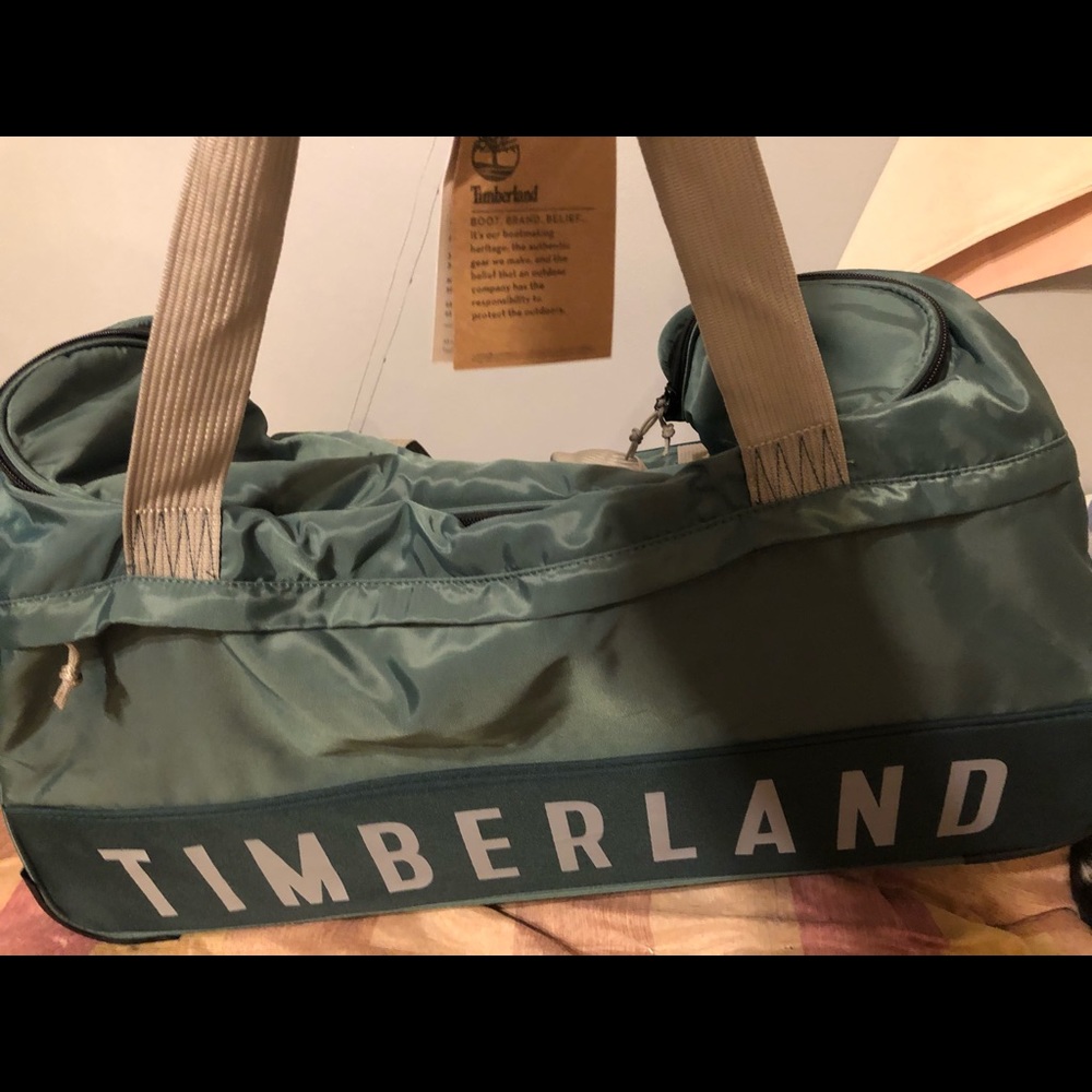 Timberland 30” wheeled duffle ocean path NWT